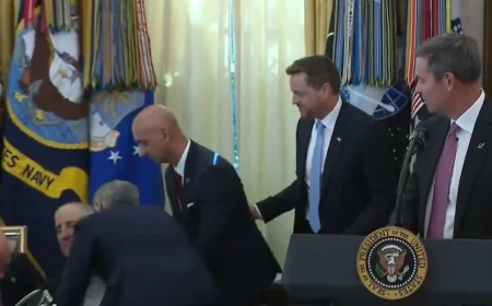 White House press event interrupted after man collapses behind President Trump during live broadcast